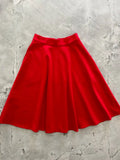 Charlotte Nova red high waisted plus size a line skirt made of smooth slightly shiny vibrant fabric