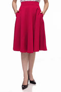 Charlotte high waisted red ponte a-line skirt with smooth fabric and two front pockets