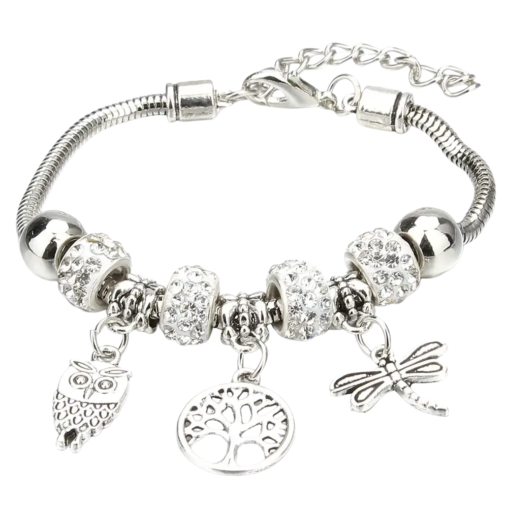Silver charm bracelet featuring crystal-encrusted beads with owl tree of life and dragonfly charms for women