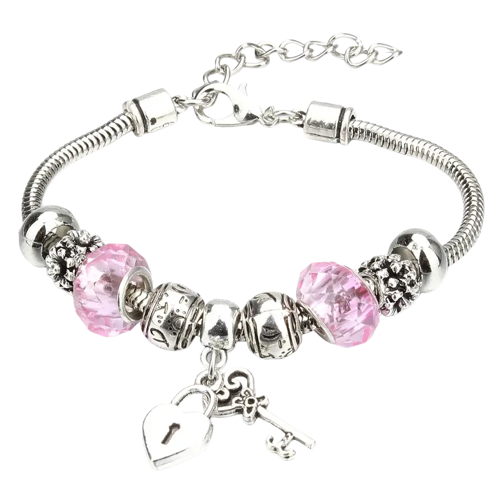 Charm bracelet for women with silver snake chain, pink crystal beads, and silver heart lock and key charms