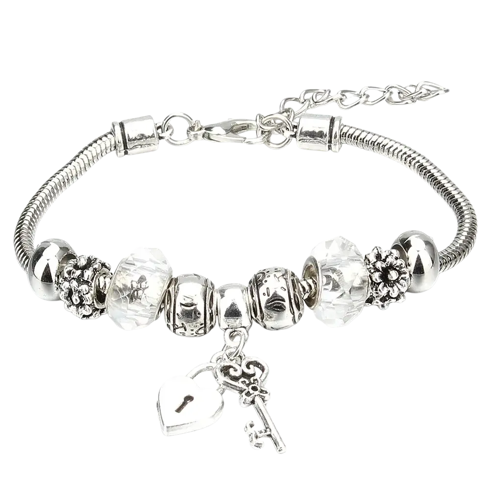 Silver charm bracelet with beaded crystal and metallic accents featuring heart lock charm and key pendant for women