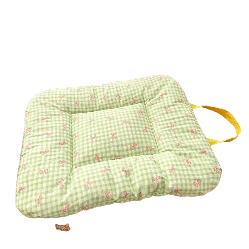Checkered bow pet bed cotton mattress with light green and pink checks and yellow carrying strap