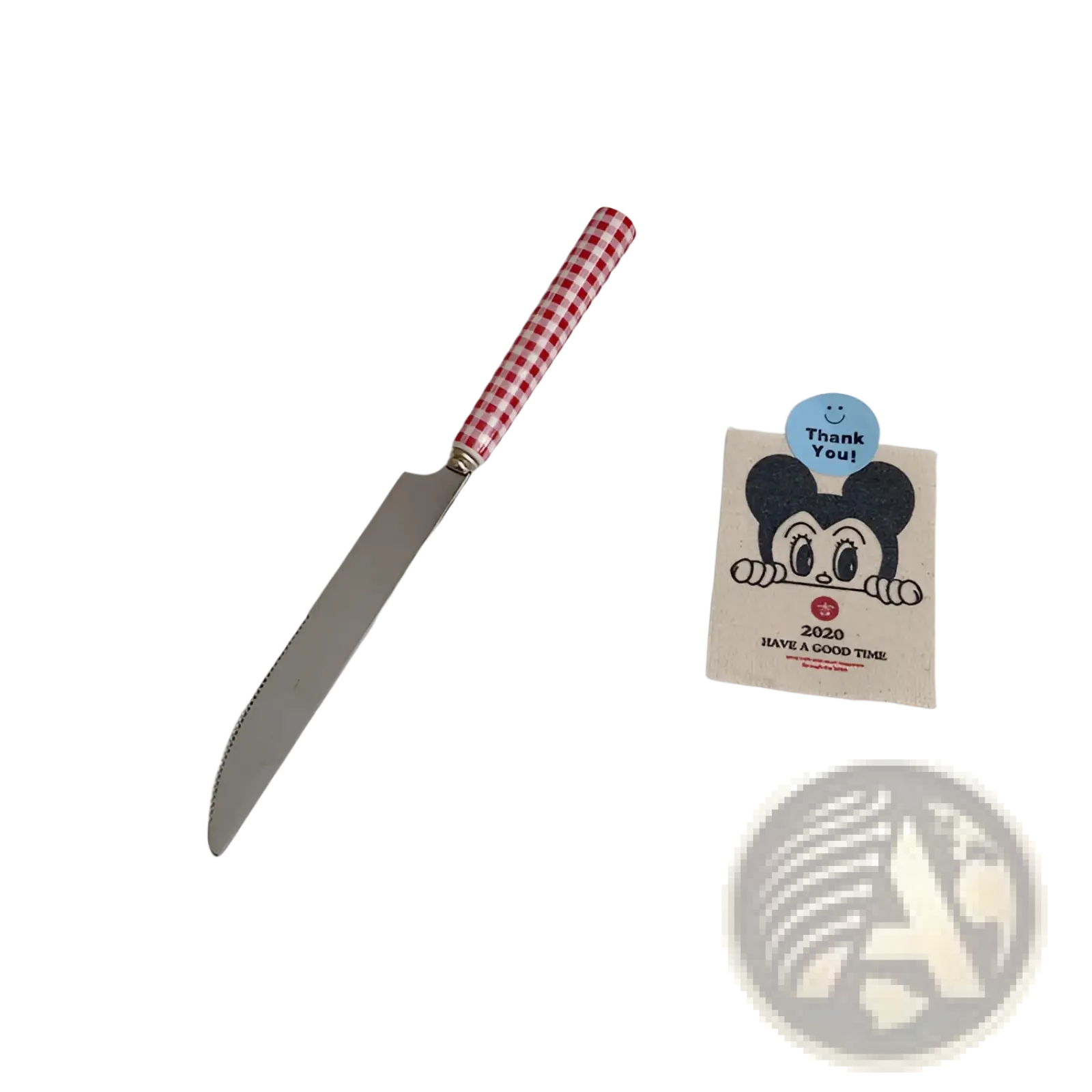 Red and white checkered handle knife with serrated stainless steel blade from checkered stainless steel cutlery set