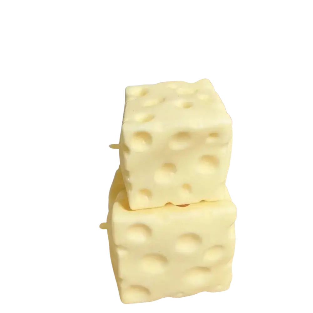Cream-colored cube-shaped cheese block stress relief squeeze toy with swiss cheese pattern for stress relief