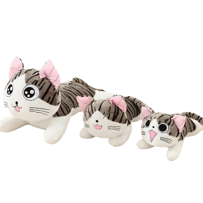 Three soft animal dolls cheese cat plush toys with gray white stripes pink bows and oversized cartoon eyes