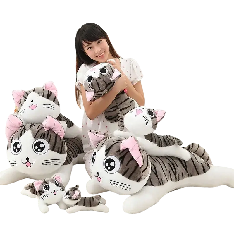 Cheese cat soft animal plush toy featuring a plush tiger-striped cat with pink bows and large expressive eyes