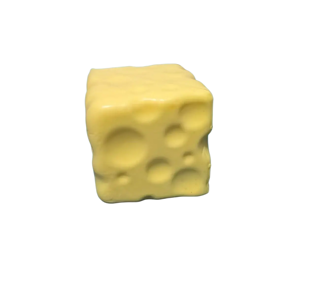 Yellow cube-shaped cheese cube stress ball soap with holes and smooth glossy surface for sensory toy use