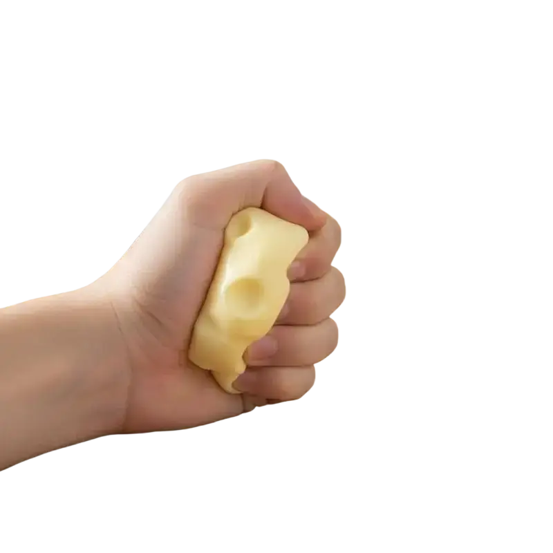 Yellow cheese-shaped fidget toy 6cm x 6cm held in hand for effective stress relief and relaxation