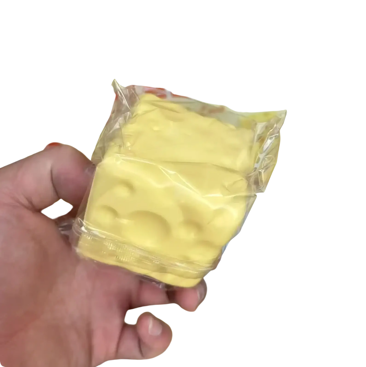 Yellow cheese-shaped fidget toy 6cm x 6cm with holes and glossy plastic wrap for stress relief