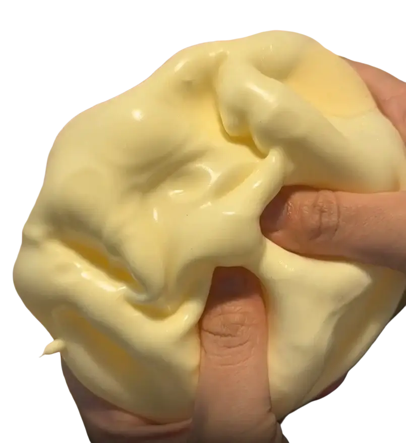 Creamy pale yellow vaseline slime cheese fidget toy being stretched for effective toy stress relief and stress relief use