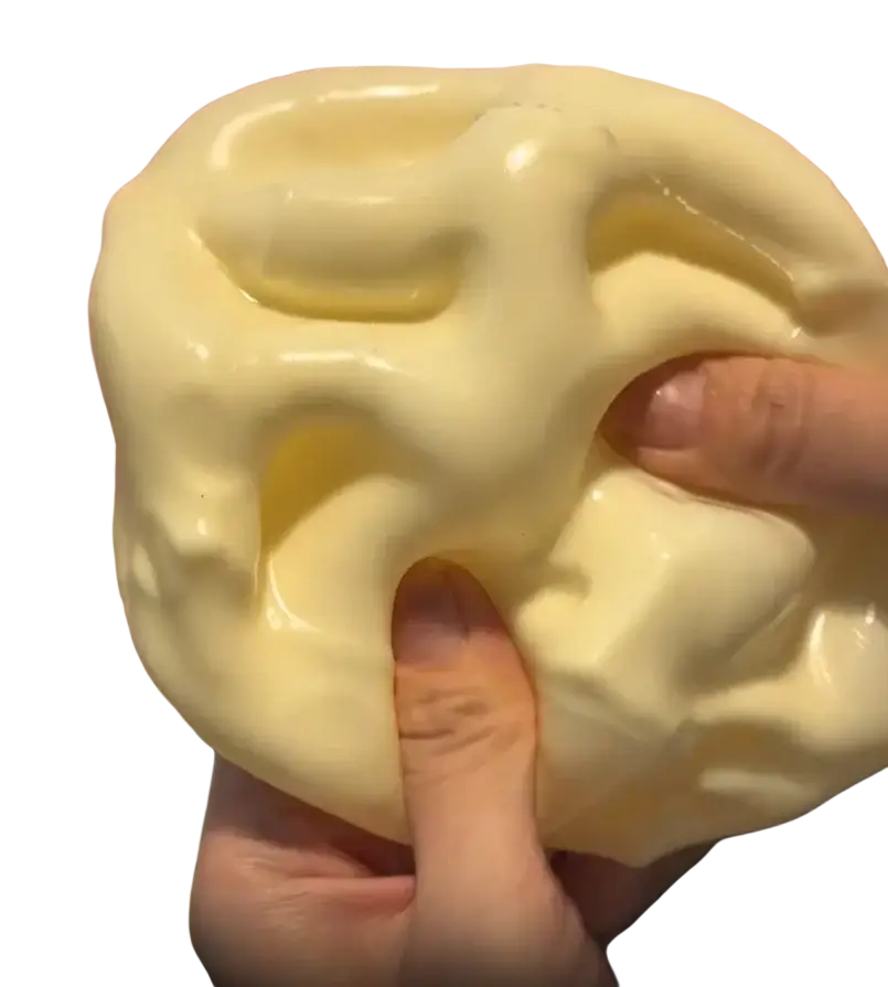 A pale yellow glossy slime molded in a brain shape cheese fidget toy for stress relief and toy stress relief