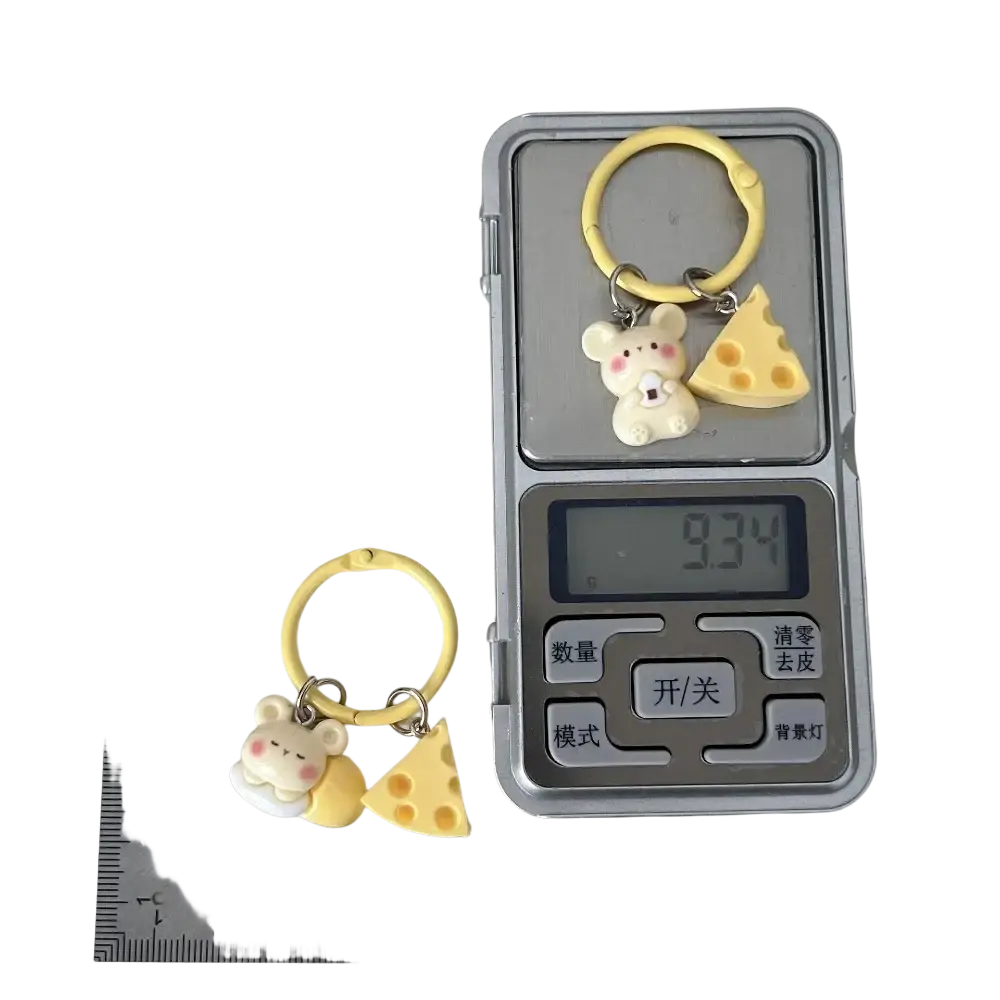 Yellow plastic cheese mouse cartoon keychain featuring a cute white mouse charm holding a slice of cheese for bag charm use