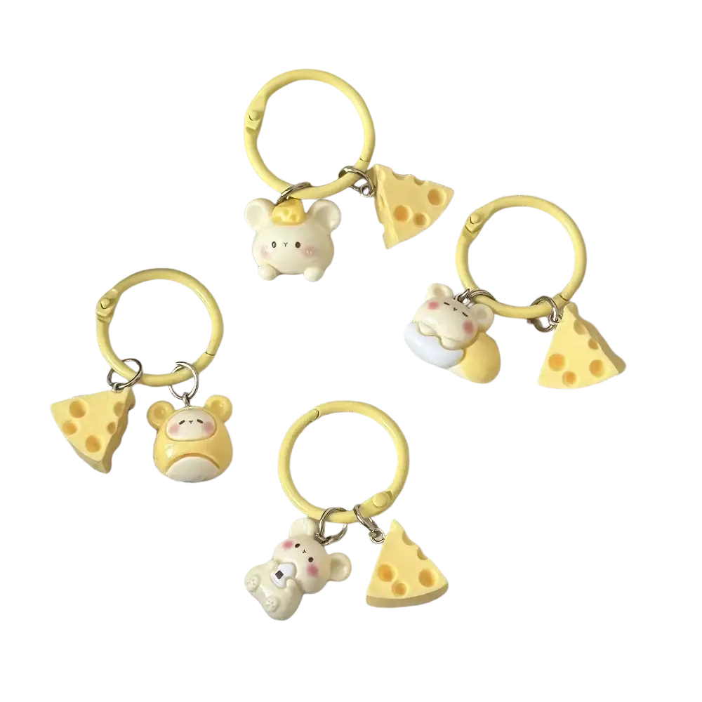 Yellow silicone cheese mouse cartoon keychain featuring a white bear charm with pink cheeks and a golden crown