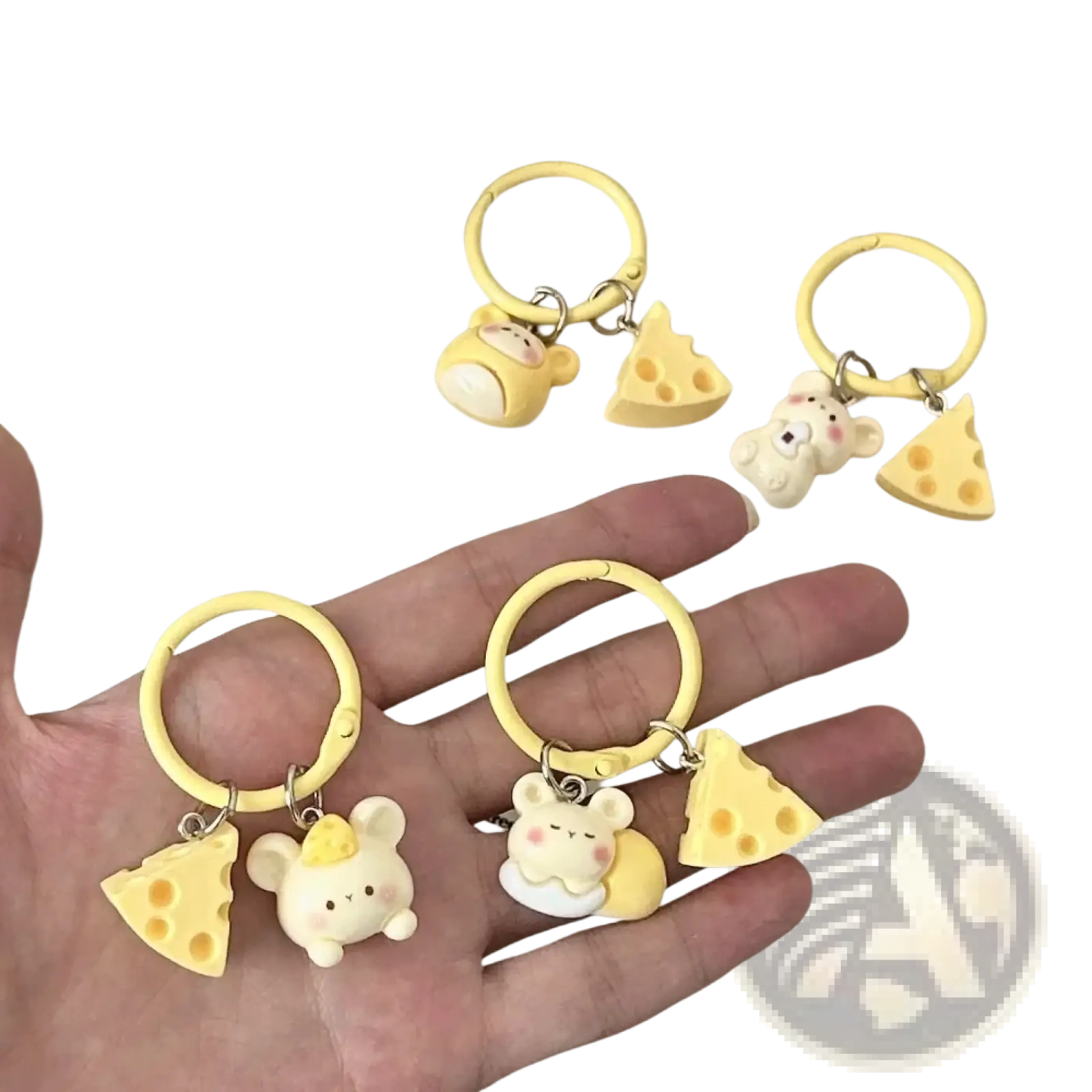 Yellow silicone keychain featuring a kawaii white mouse charm and cheese slice pendant for bag decoration