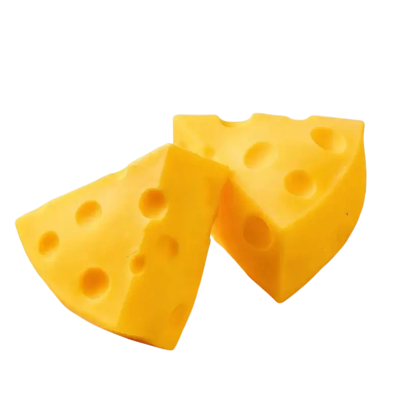 Two bright yellow cheese squishy silicone molds with holes on a white plate ideal as party favors