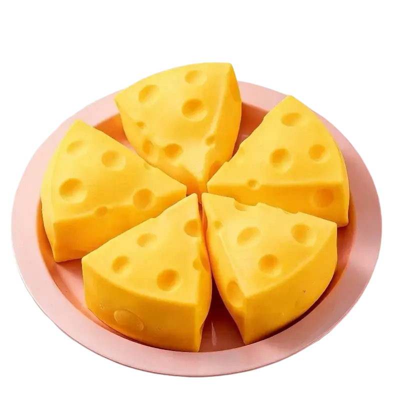 Yellow cheese squishy slow rising sensory toy pieces arranged on a pink plate ideal for party favors