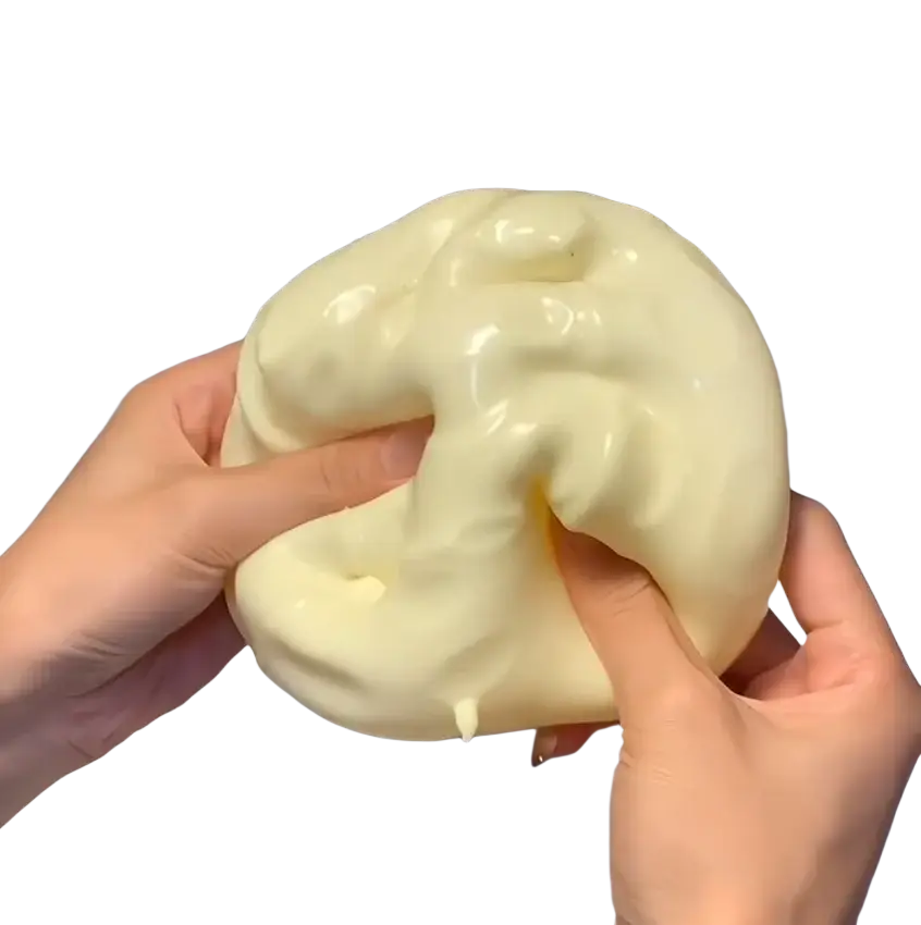 Cream-colored glossy cheese squishy toy with soft stretchy texture for slow rising sensory stress relief