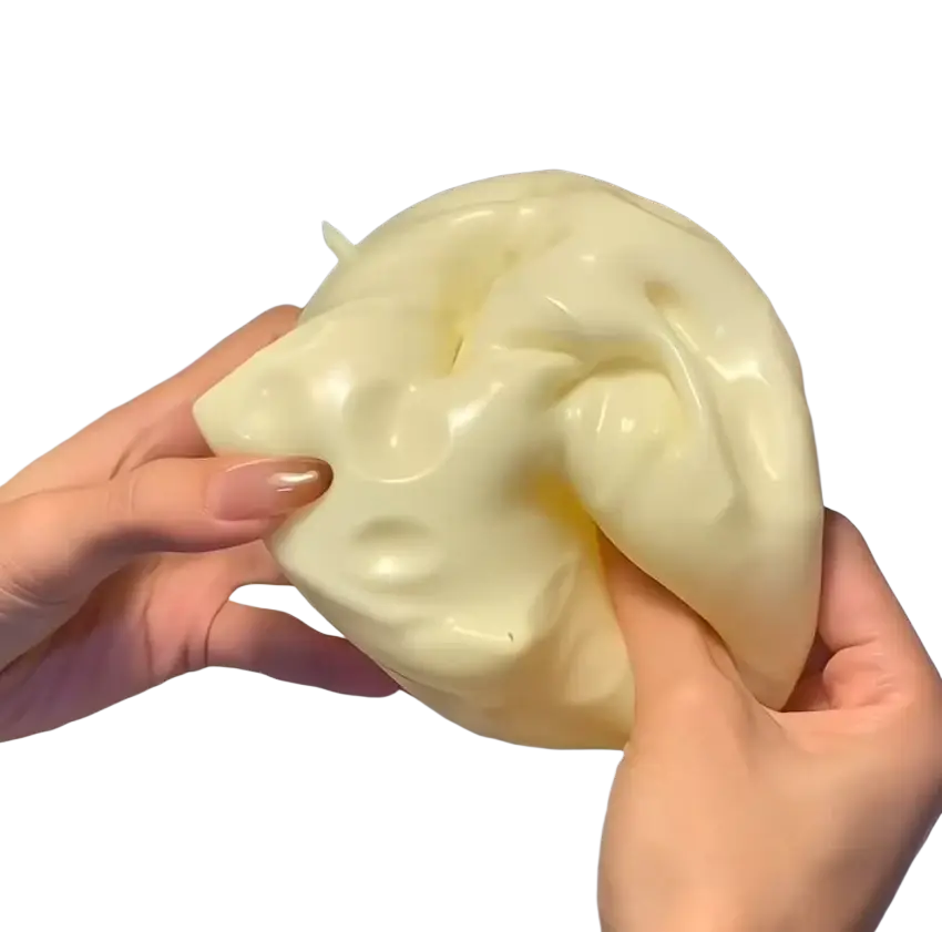Cream-colored glossy cheese squishy toy made of stretchy silicone slow rising sensory stress relief squishy toy