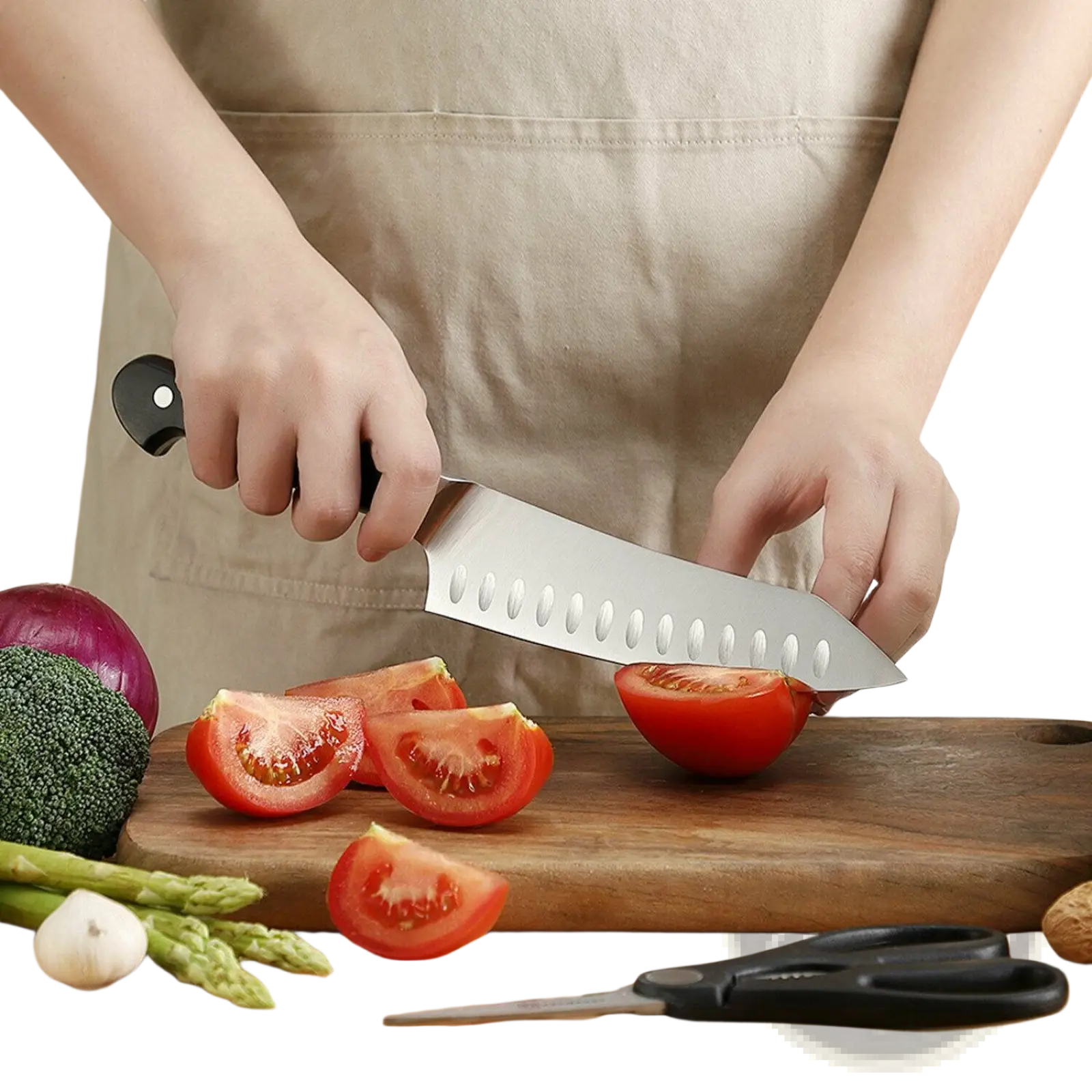 A sleek stainless steel chef knife with black handle and oval indentations in chef knife set with kitchen shears