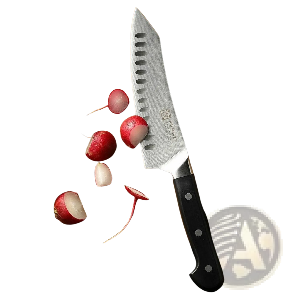 A sleek black-handled kai santoku chef knife with stainless steel oval-edged blade from chef knife set with kitchen shears