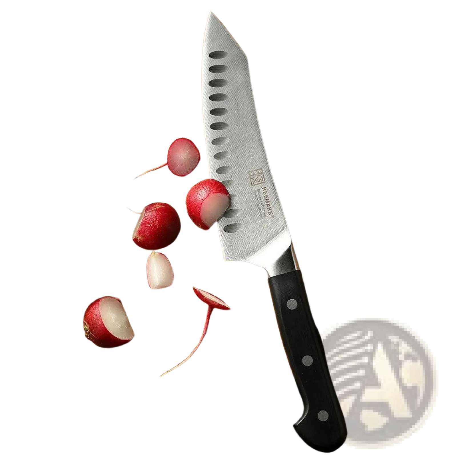 A sleek black-handled kai santoku chef knife with stainless steel oval-edged blade from chef knife set with kitchen shears