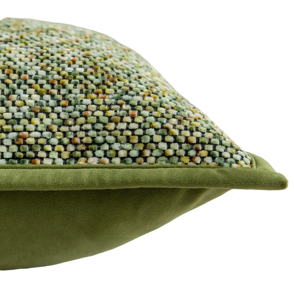 Chenille throw pillow cover with textured green woven pattern and velvet trim for decorative use