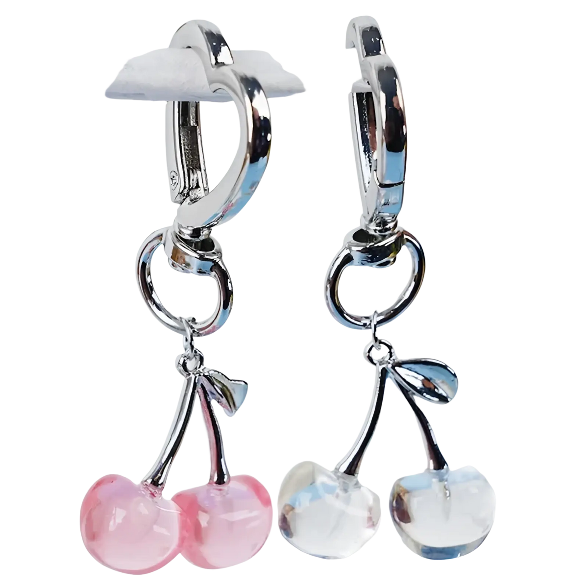 A pair of silver-toned hoop earrings with dangling pink and clear faceted cherry charms from cherry bag charm heart keychain