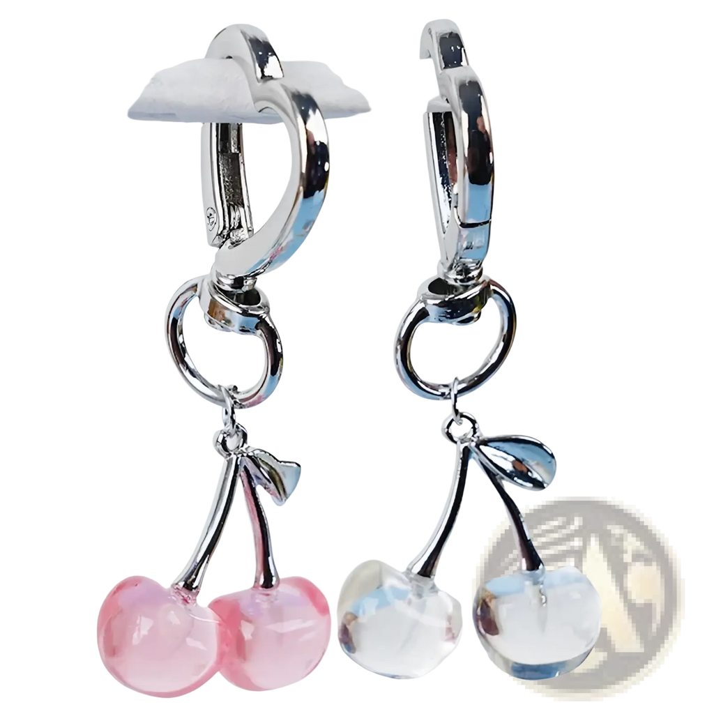 A pair of silver-toned hoop earrings with dangling pink and clear faceted cherry charms from cherry bag charm heart keychain