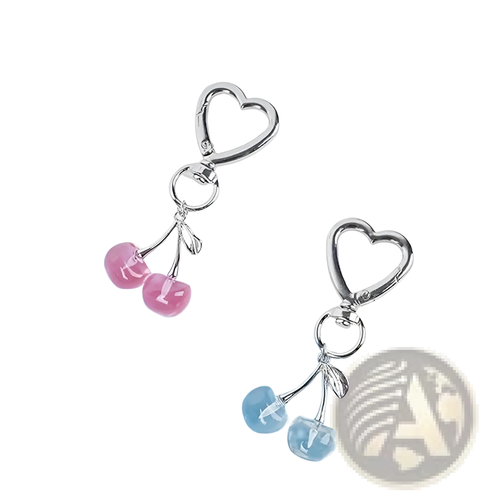 Silver heart-shaped keychain with dangling pink and blue cherry charms designed as a stylish bag charm accessory