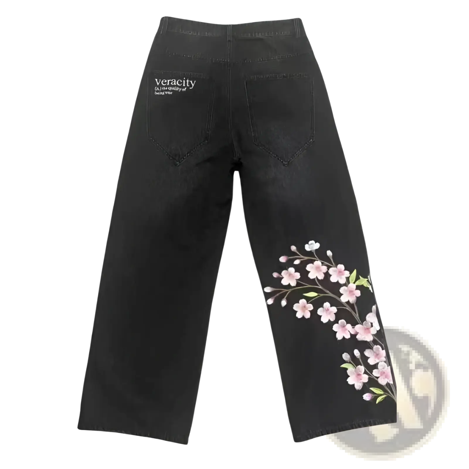 Black denim jeans with delicate pink cherry blossom embroidery on the lower leg from the front view