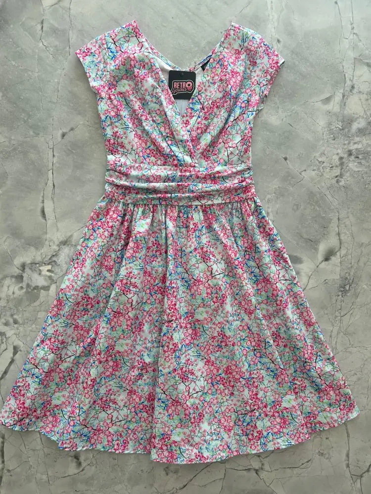 Cherry Blossom Greta 1950s vintage cotton flutter dress with pink blossom floral print short sleeves and v-neckline