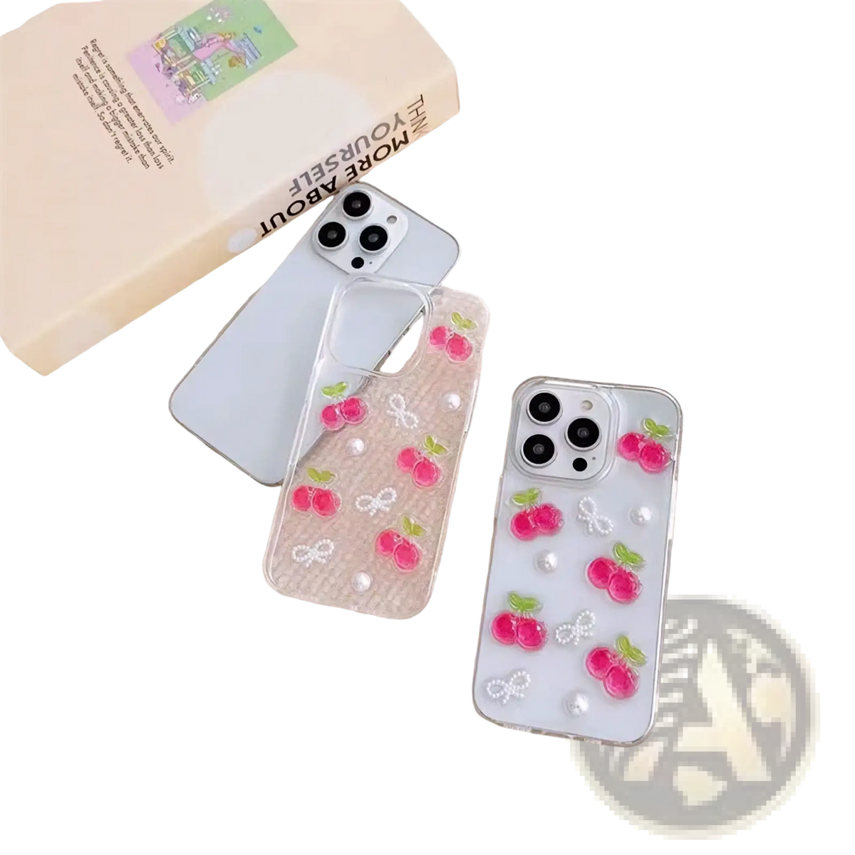 Back side of clear and white iphone cases with pink cherry decals, pearl-like embellishments, and delicate bow designs