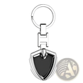 Silver shield-shaped Chevrolet metal car keychain with black inlay and polished metallic finish