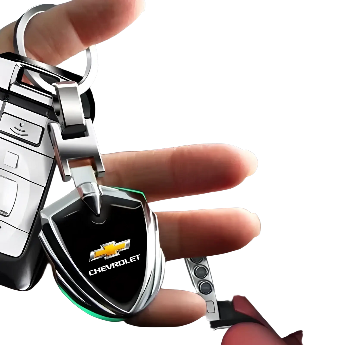 Shiny silver Chevrolet metal shield car keychain with black shield design and glowing green LED light