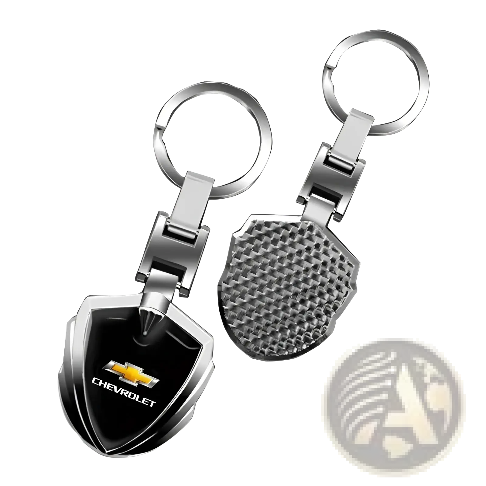 Silver and black shield-shaped chevrolet metal shield car keychain showing textured carbon fiber pattern on back side