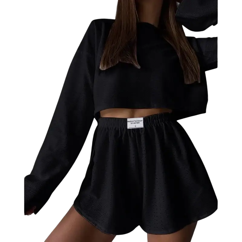 Black cropped long sleeve top with elastic waistband and subtle texture from chic pajama set with split shorts breathable design