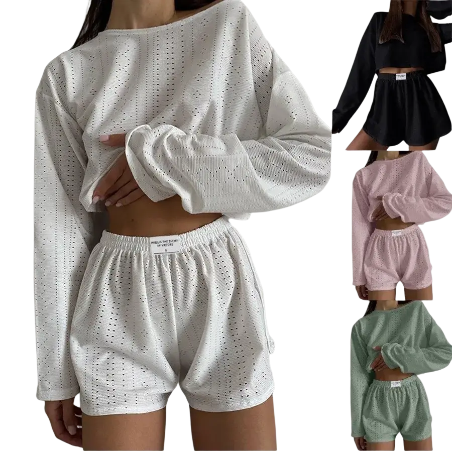 White eyelet knit chic pajama set featuring breathable high split shorts and a matching crop top for comfortable wear