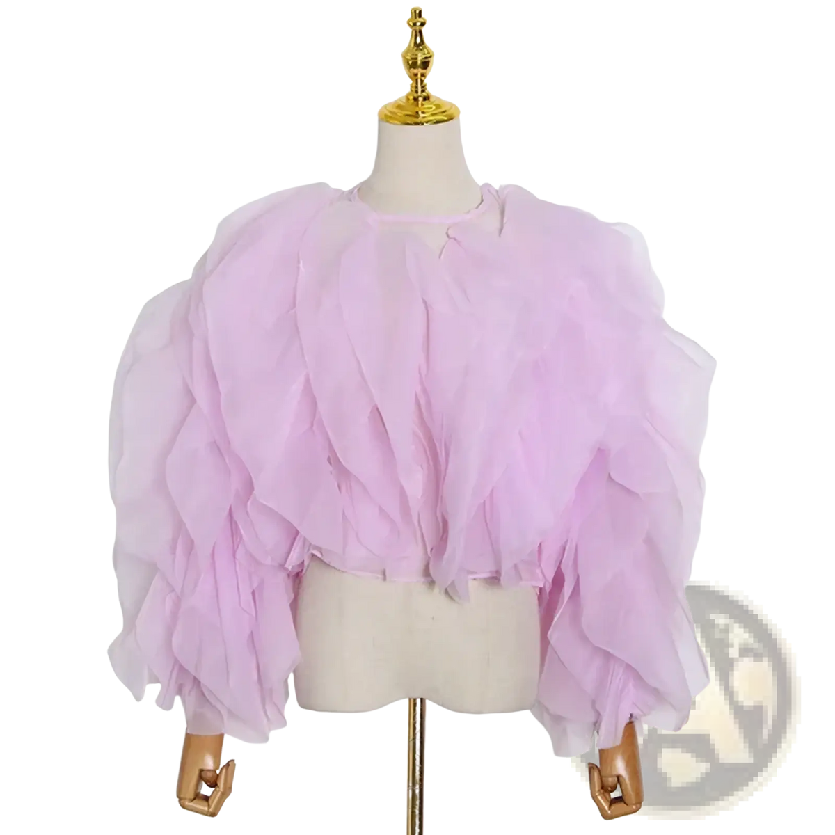 A delicate light pink ruffled mesh crop top with voluminous sleeves displayed on a mannequin from chicever