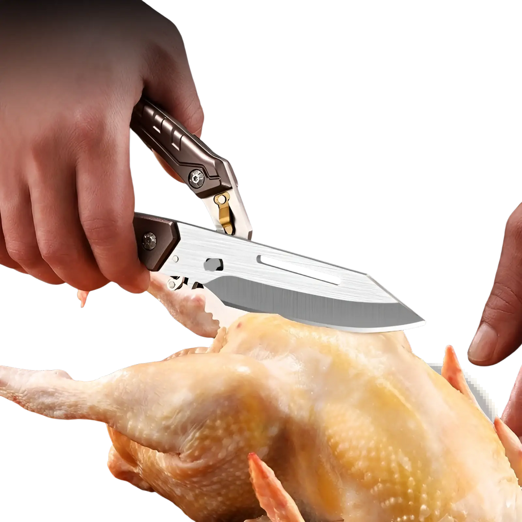 A sleek silver-bladed chicken bone scissors with a black and gold textured handle cutting chicken