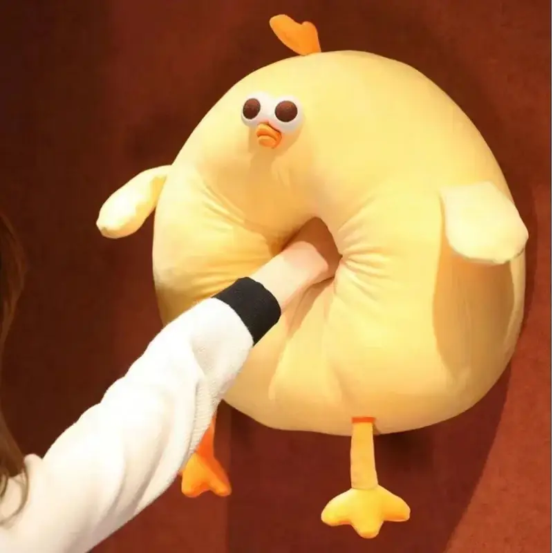 Yellow plush stuffed chick-shaped neck pillow with orange beak and feet soft stuffed animal from mainland china