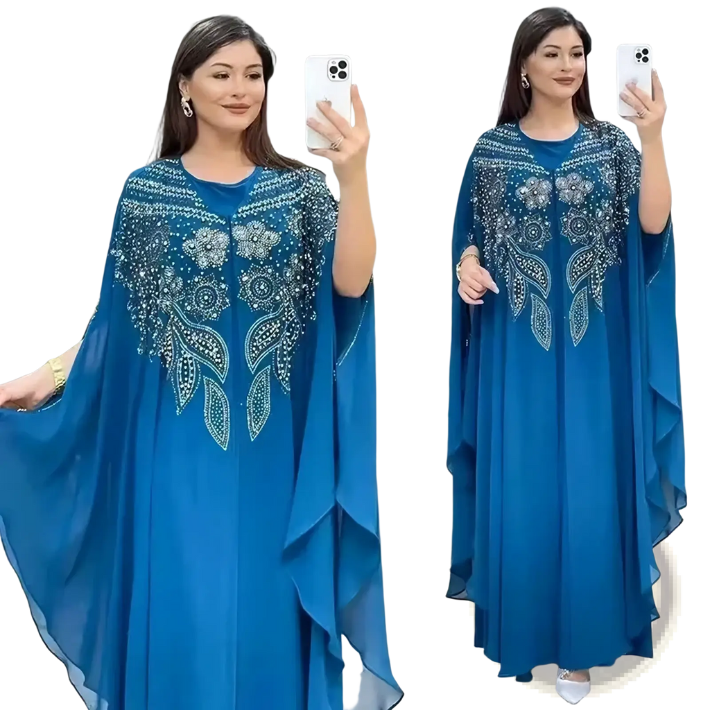 A flowing royal blue chiffon beaded luxury abaya dress with intricate silver floral and leaf embroidery on the front