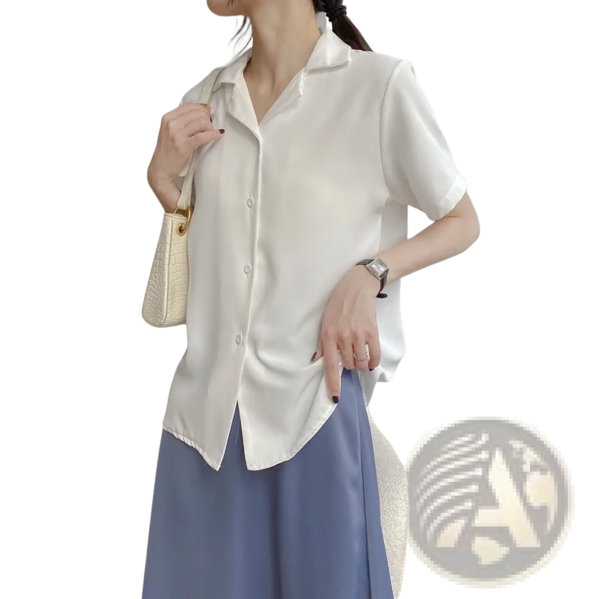 A crisp white chiffon blouse with short sleeves and a subtle sheen perfect for summer wear