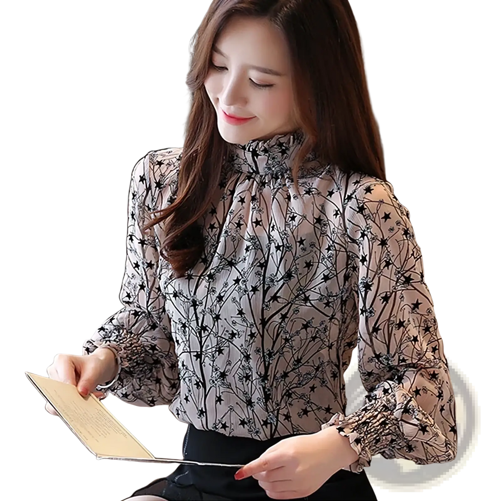 A sheer light gray chiffon floral print long sleeve blouse with a high collar and ruched sleeves featuring black stars and branches