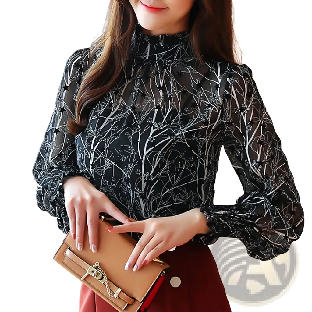 Tan leather clutch with gold-tone hardware and chain strap paired with chiffon floral print long sleeve blouse