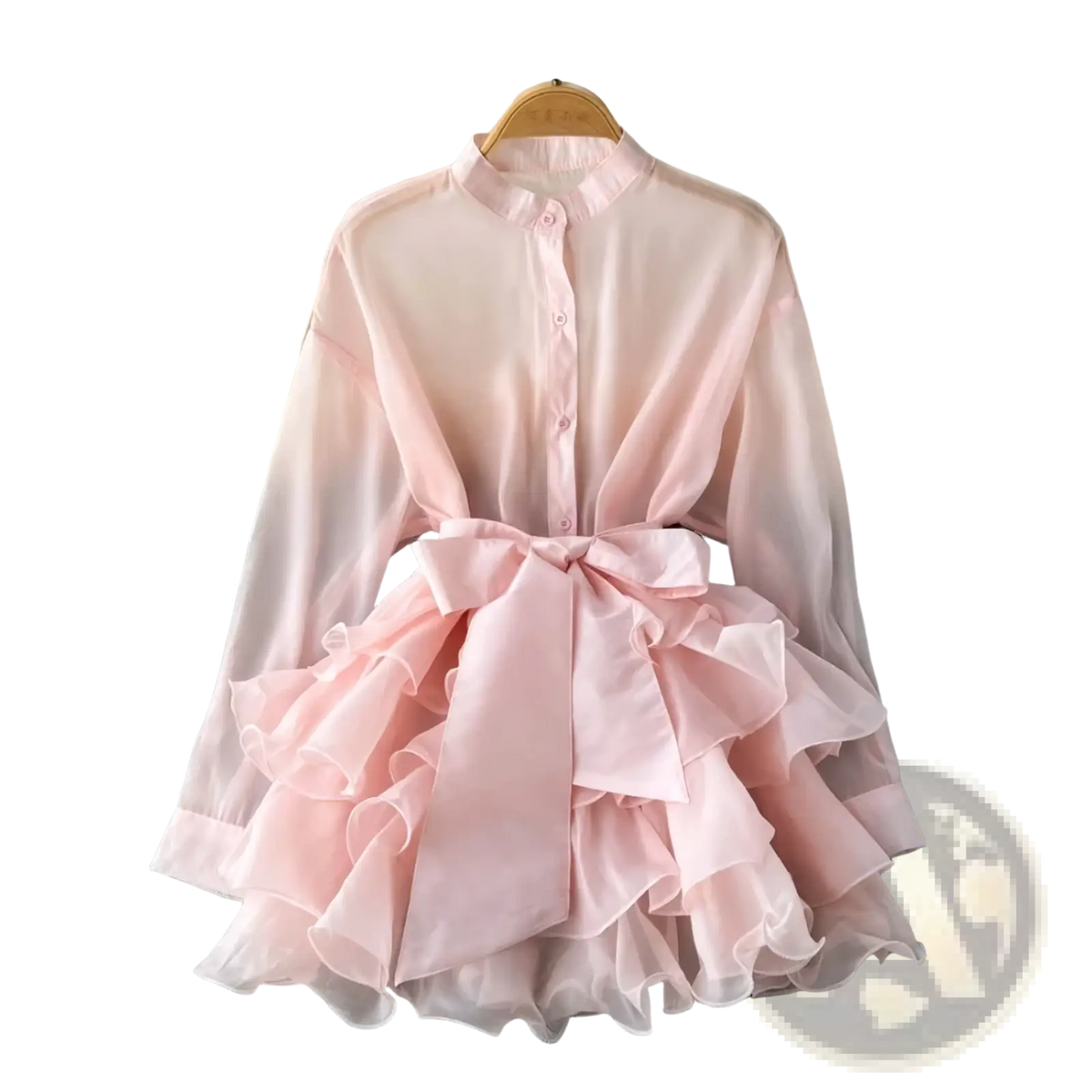 A delicate pink chiffon ruffle blouse with long sleeves, high collar, button front, and oversized bow at the waist