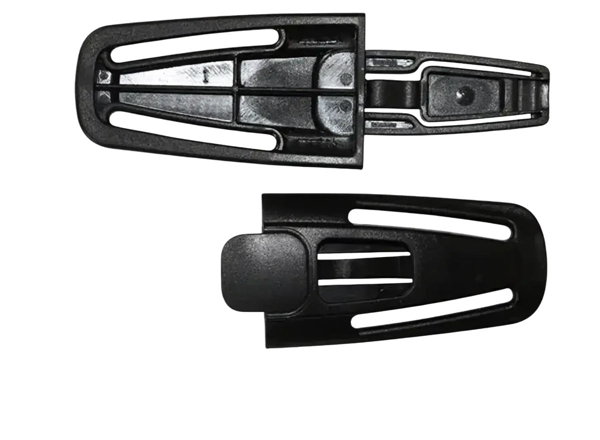 Black plastic child safety seat strap clip with a clip mechanism and two distinct sides shown open
