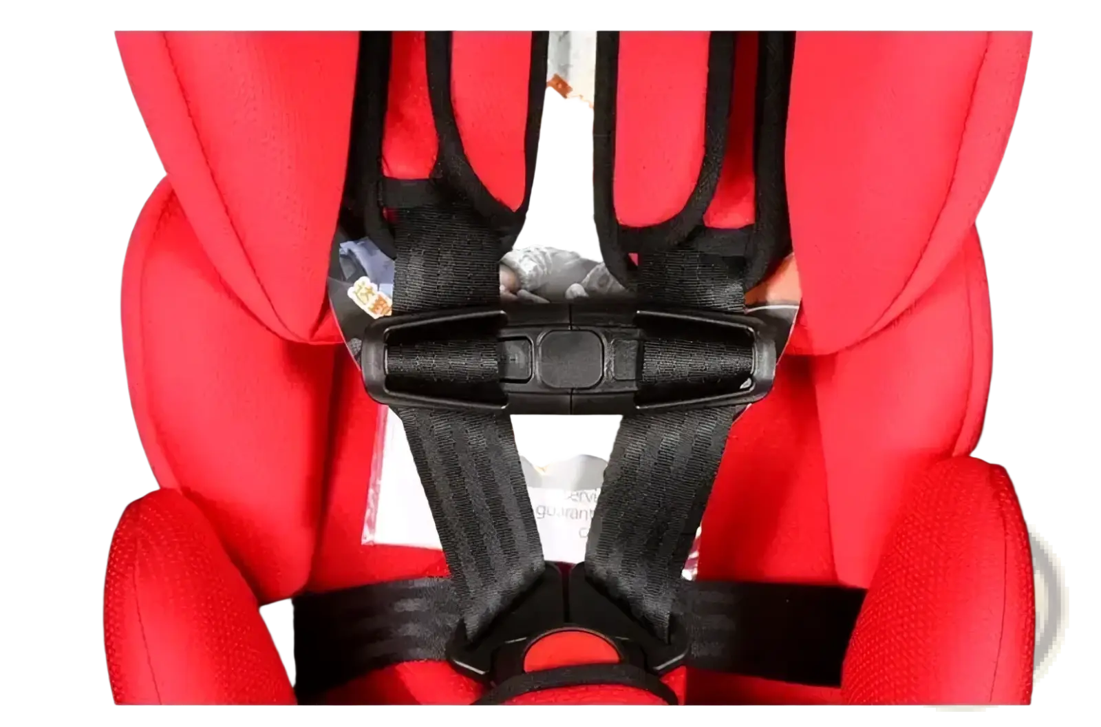 Red child safety seat strap clip with black harness straps and buckle securely attached to a car seat