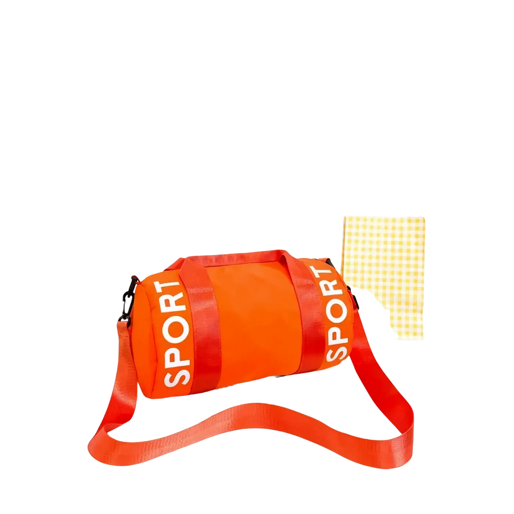 Kids sports duffle bag in vibrant orange with bold white sport lettering on red straps and adjustable crossbody strap