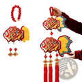 Vibrant red and gold gilded fish ornaments with yellow fins hanging from wooden bead ropes with plush tassels for chinese new year horse decor