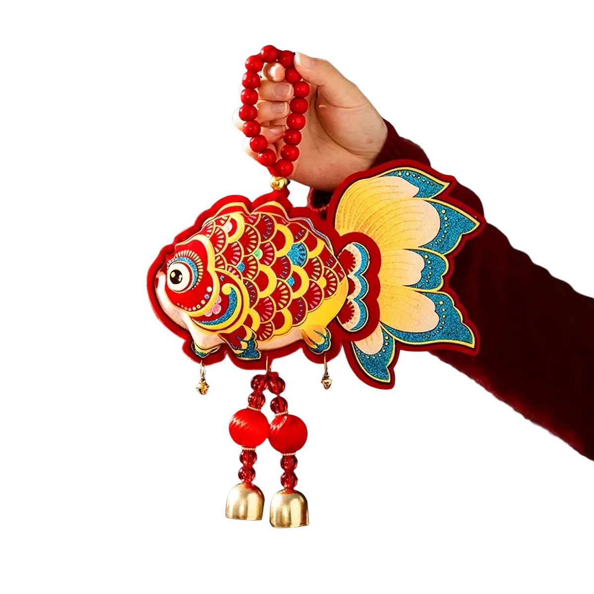 A vibrant red and gold fish-shaped Chinese New Year hanging ornament with intricate patterns blue fins and festive tassels